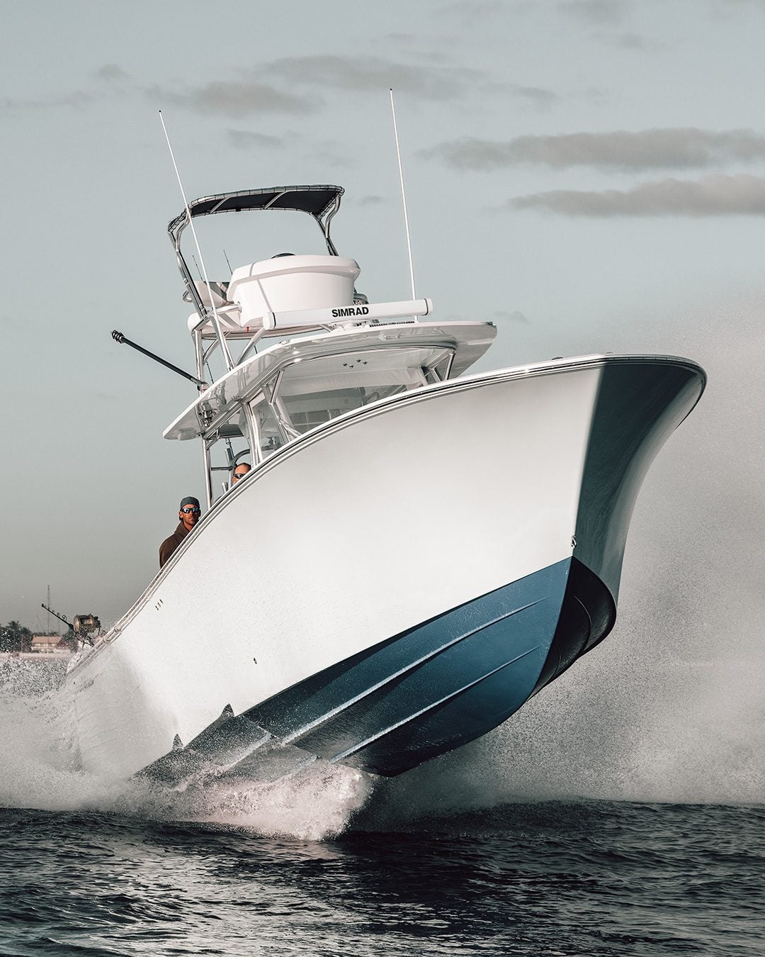 Dynamic fishing boat action photography capturing spray and motion - Professional sportfish running shot in South Florida